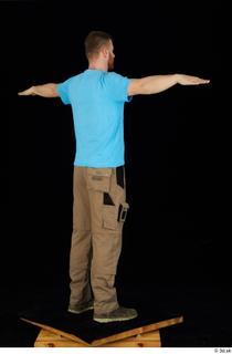 Victor blue t shirt brown shoes dressed shoes standing t-pose…